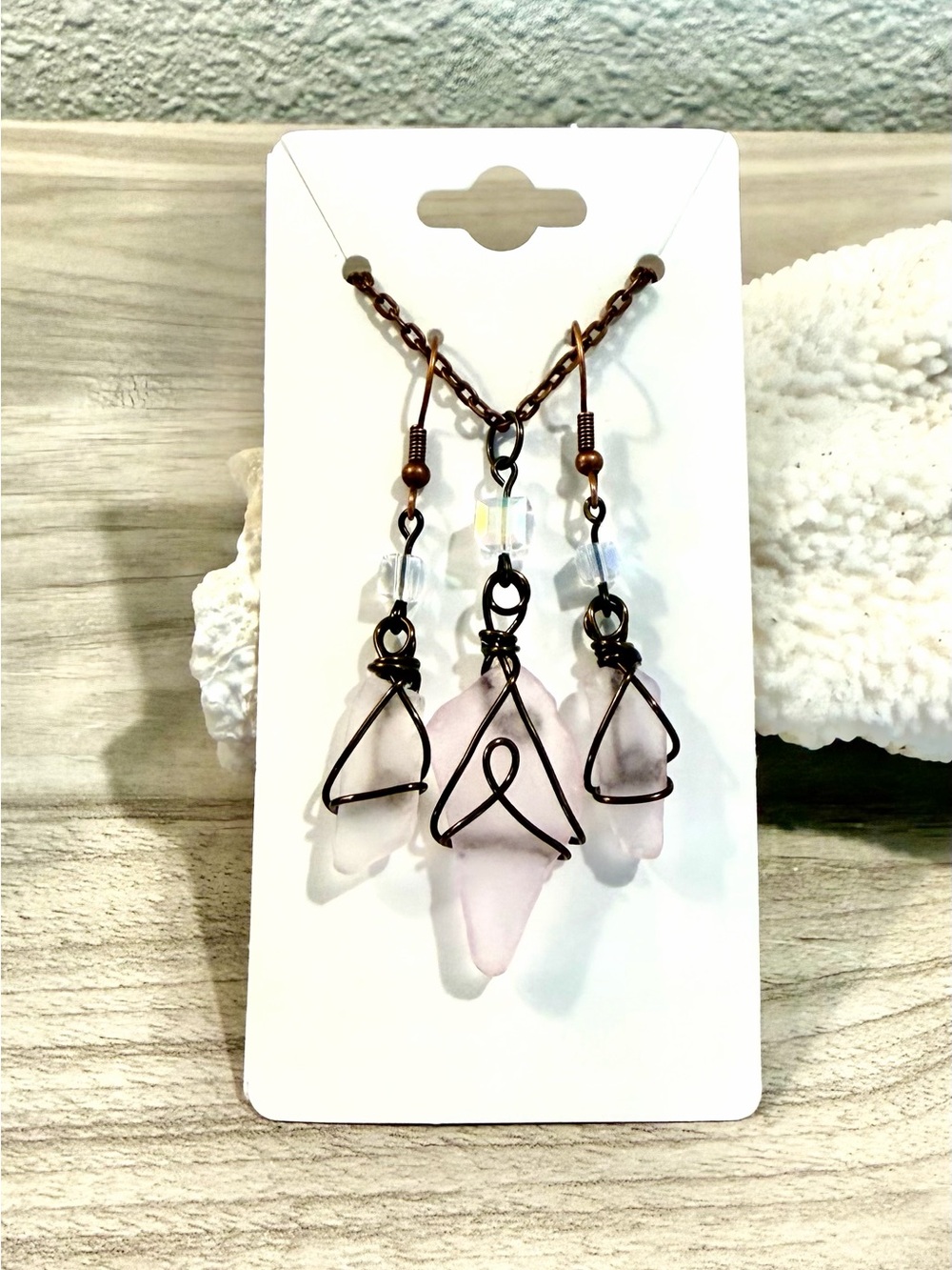 104. Pink sea glass set with iridescent beads